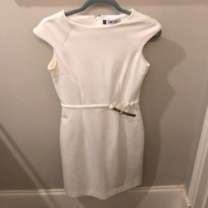 White dress with gold belt